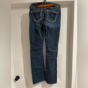 Women’s silver jeans, 29W 35L